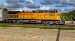 UP 6459 leads the empty piper with a handful of PSR racks.